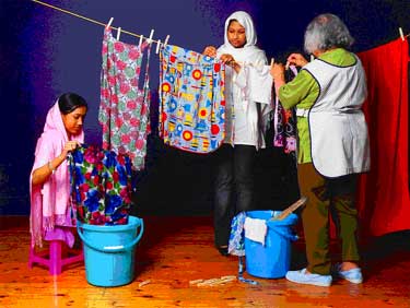 Picture of women hanging out washing
